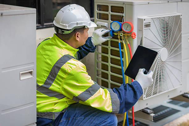 Professional Hvac technician working in Martinsville, VA